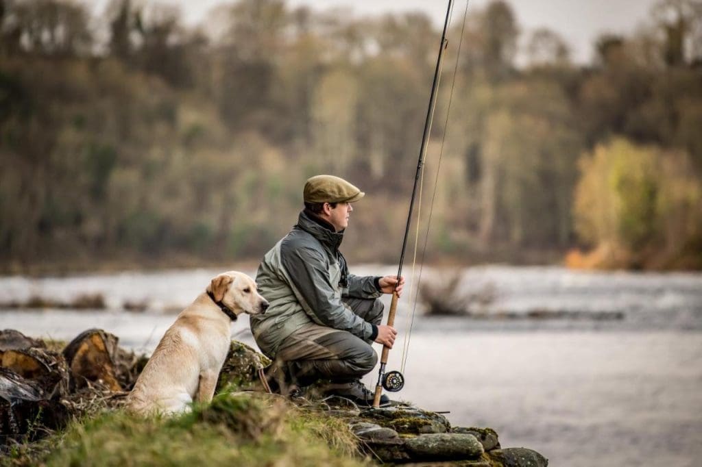 man_and_dog_fishing